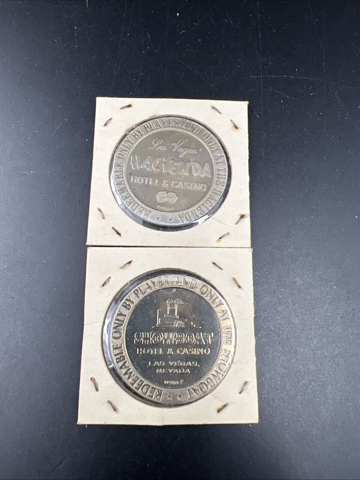 Lot of 2 Specimine / Proof Strike Casino Tokens Las Vegas Showboat & Hacienda