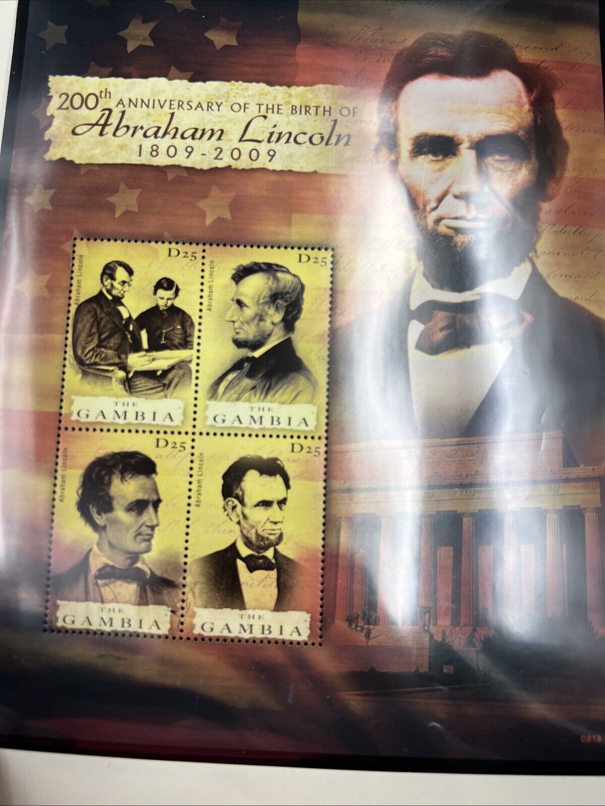 The Abraham Lincoln Coin and Stamp Collection set with Silver Dollar Stamps +