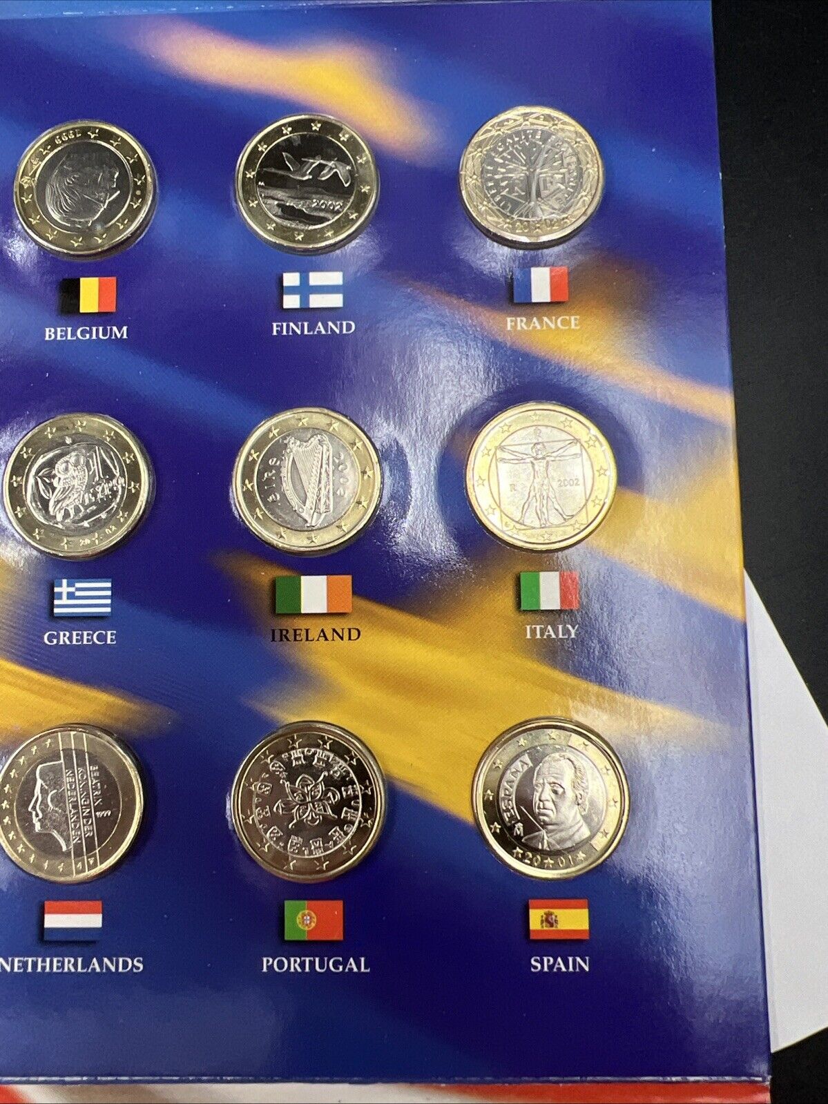 The 50 State Quarters & Euro Coin Collection 5 2002 BU QTRs + 12 BU Euro Coins