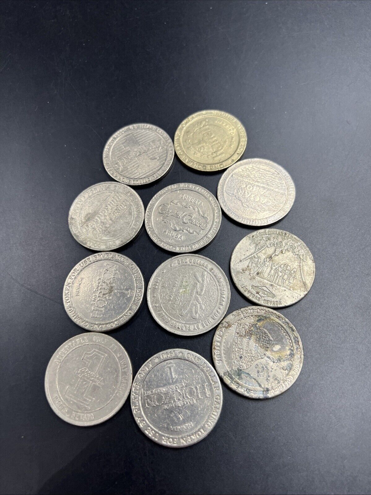 Lot of 11 $1 Casino Gaming Tokens Metal Very Circulated Conditions