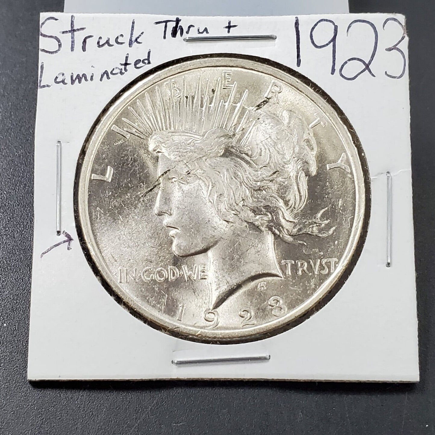 1923 P Peace 90% Silver Eagle Dollar Coin Struck Thru Error Coin Obverse
