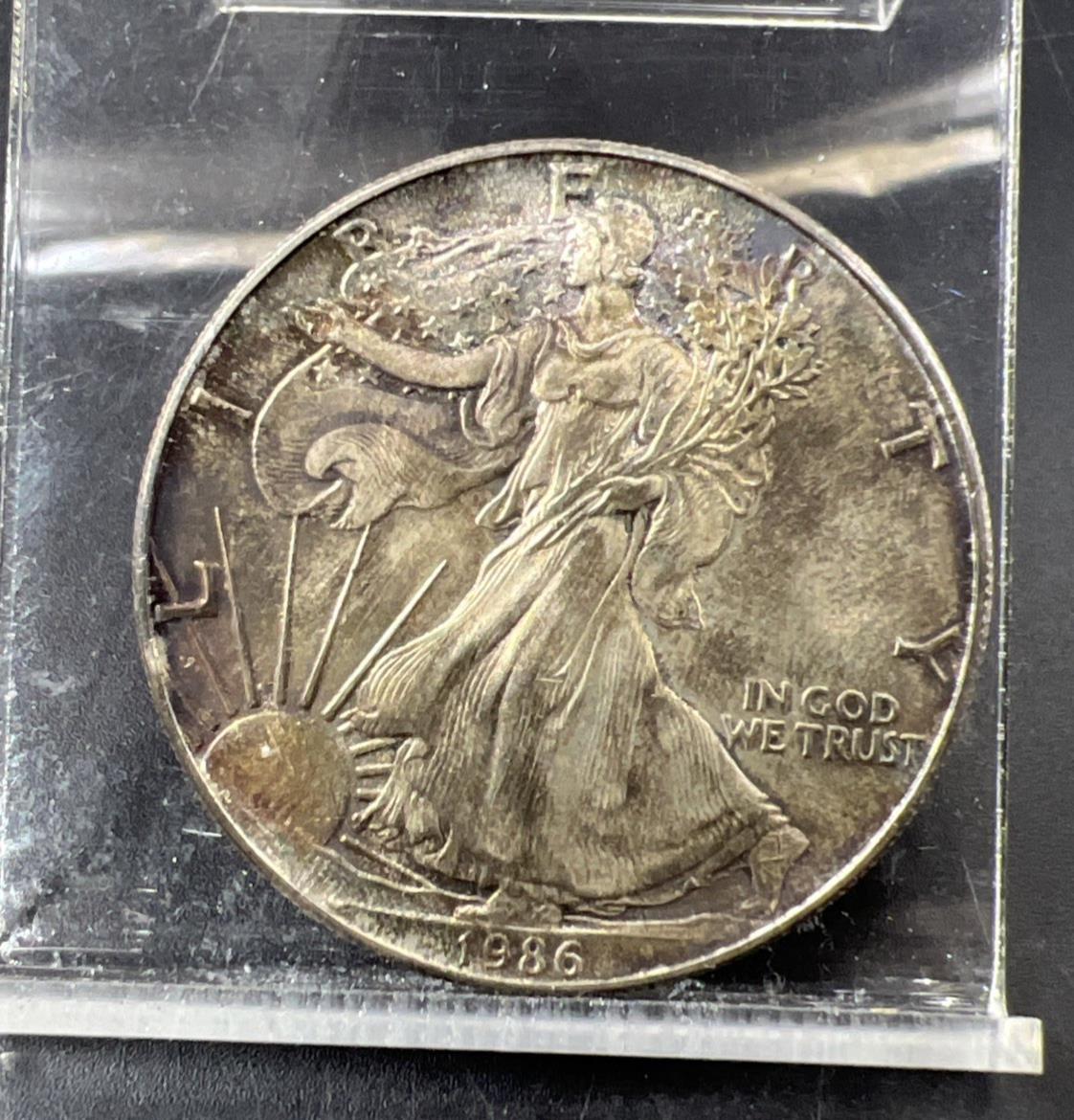 1986 1 OZ American Silver Eagle CH AU About UNC Neat Toning Toner