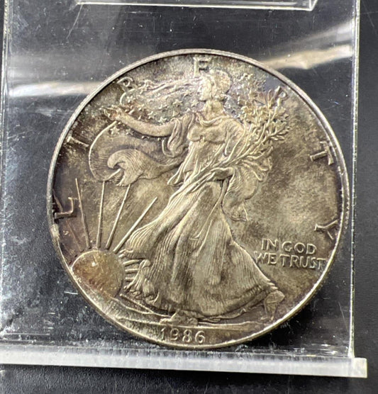 1986 1 OZ American Silver Eagle CH AU About UNC Neat Toning Toner