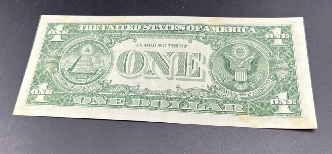 1957 B $1 One Dollar Silver Certificate Blue Seal UNC Details stain #371