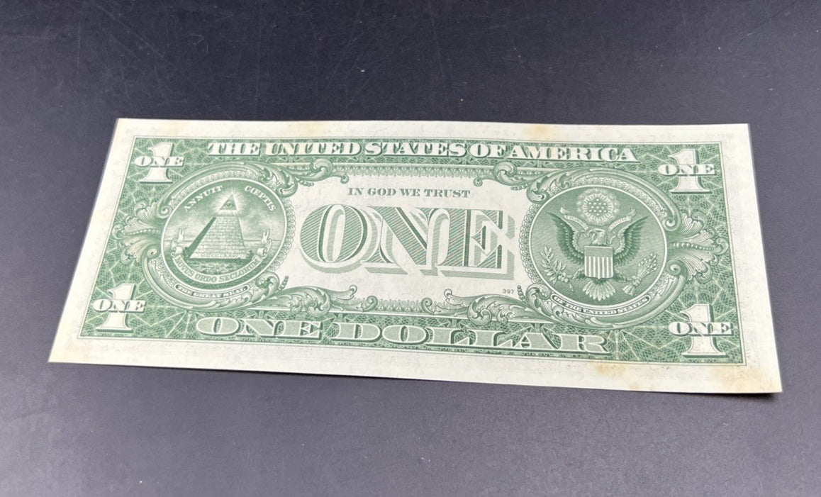 1957 B $1 One Dollar Silver Certificate Blue Seal UNC Details stain #371