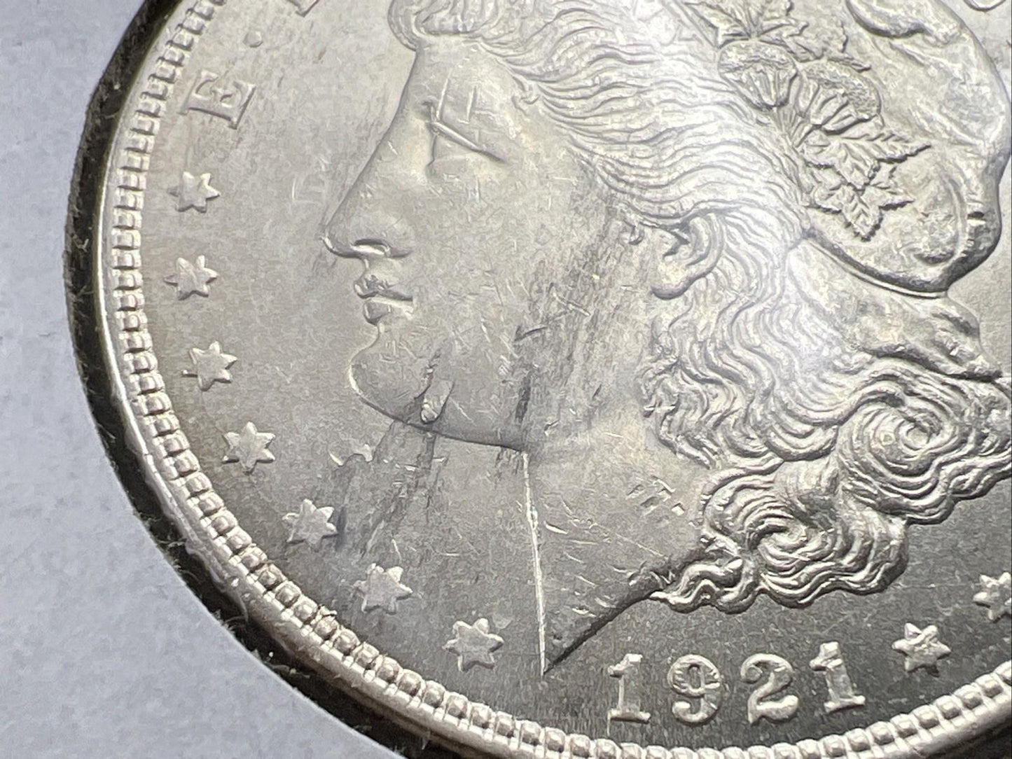 1921 P $1 Morgan Silver Dollar Error Coin Laminated Planchet Obverse UNC Details