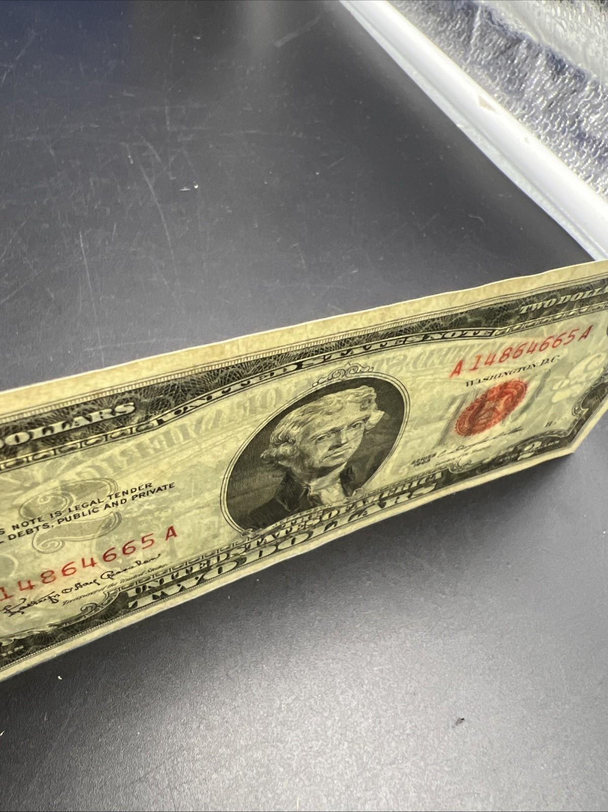 1963 $2 Two Dollar USN Red Seal Legal Tender Note UNC Details water damage #665