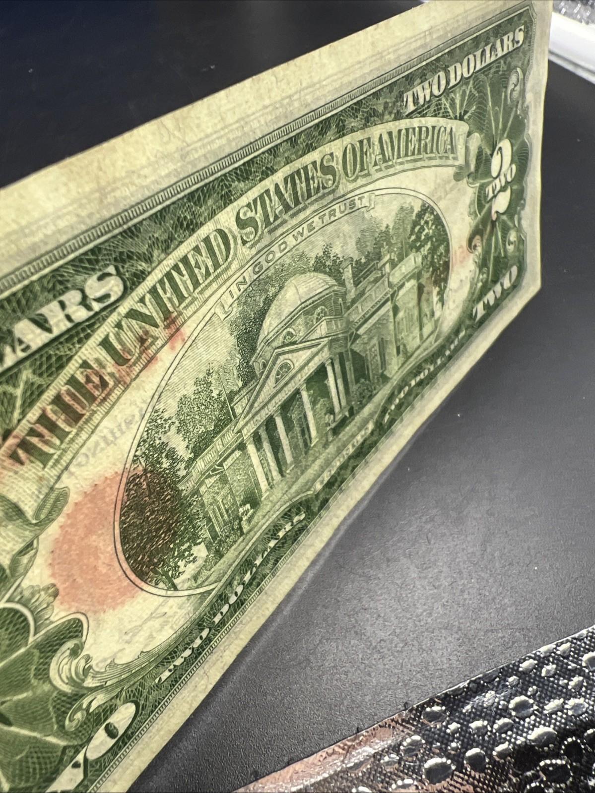 1963 $2 Two Dollar USN Red Seal Legal Tender Note UNC Details water damage #665