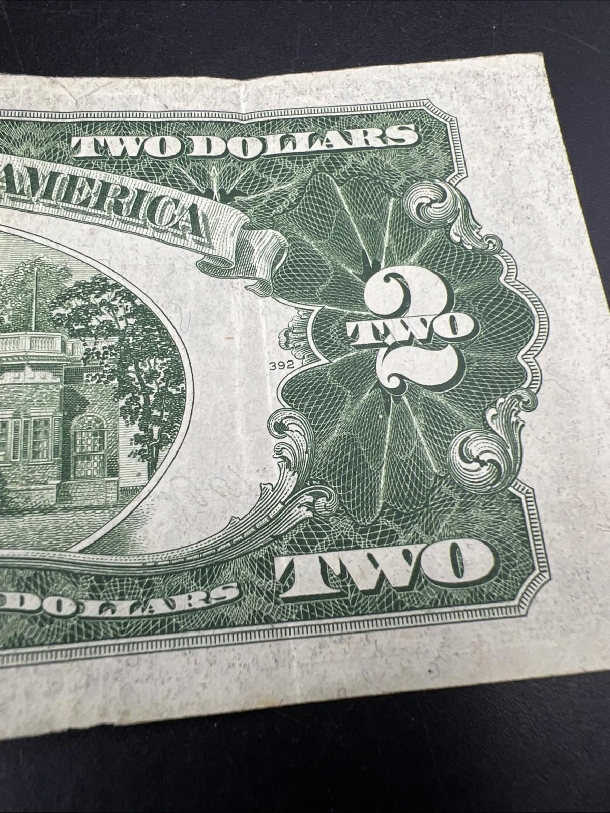 1953 * Star A $2 USN United States Note Red Seal Fine Details Corner Tear #61A