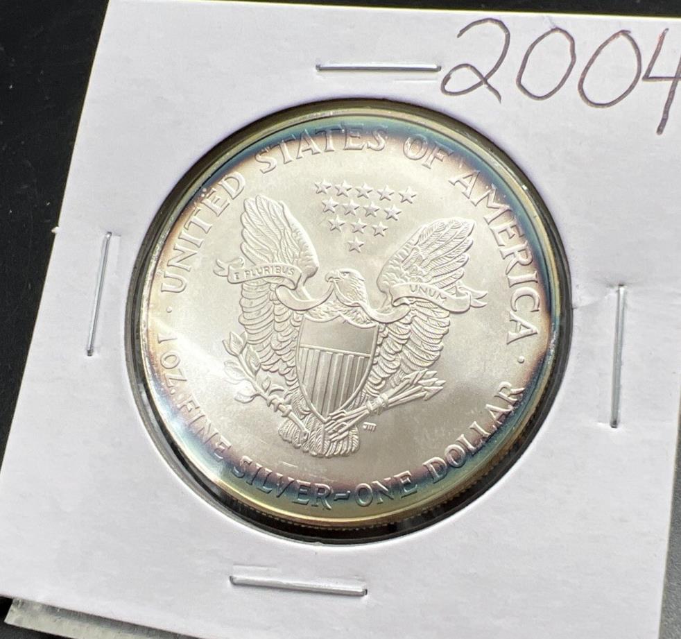 2004 1 OZ American Silver Eagle GEM BU Unc .999 Nice Toning Toner Nearly Halo