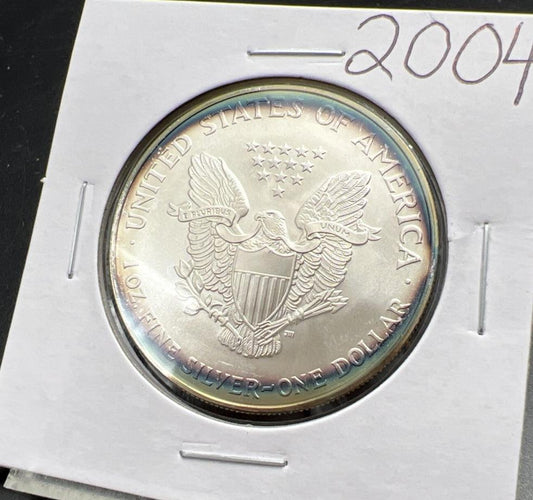 2004 1 OZ American Silver Eagle GEM BU Unc .999 Nice Toning Toner Nearly Halo