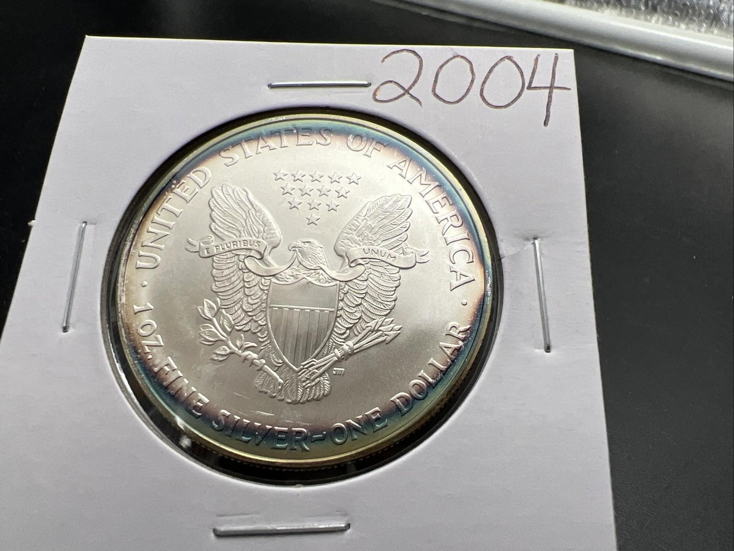 2004 1 OZ American Silver Eagle GEM BU Unc .999 Nice Toning Toner Nearly Halo
