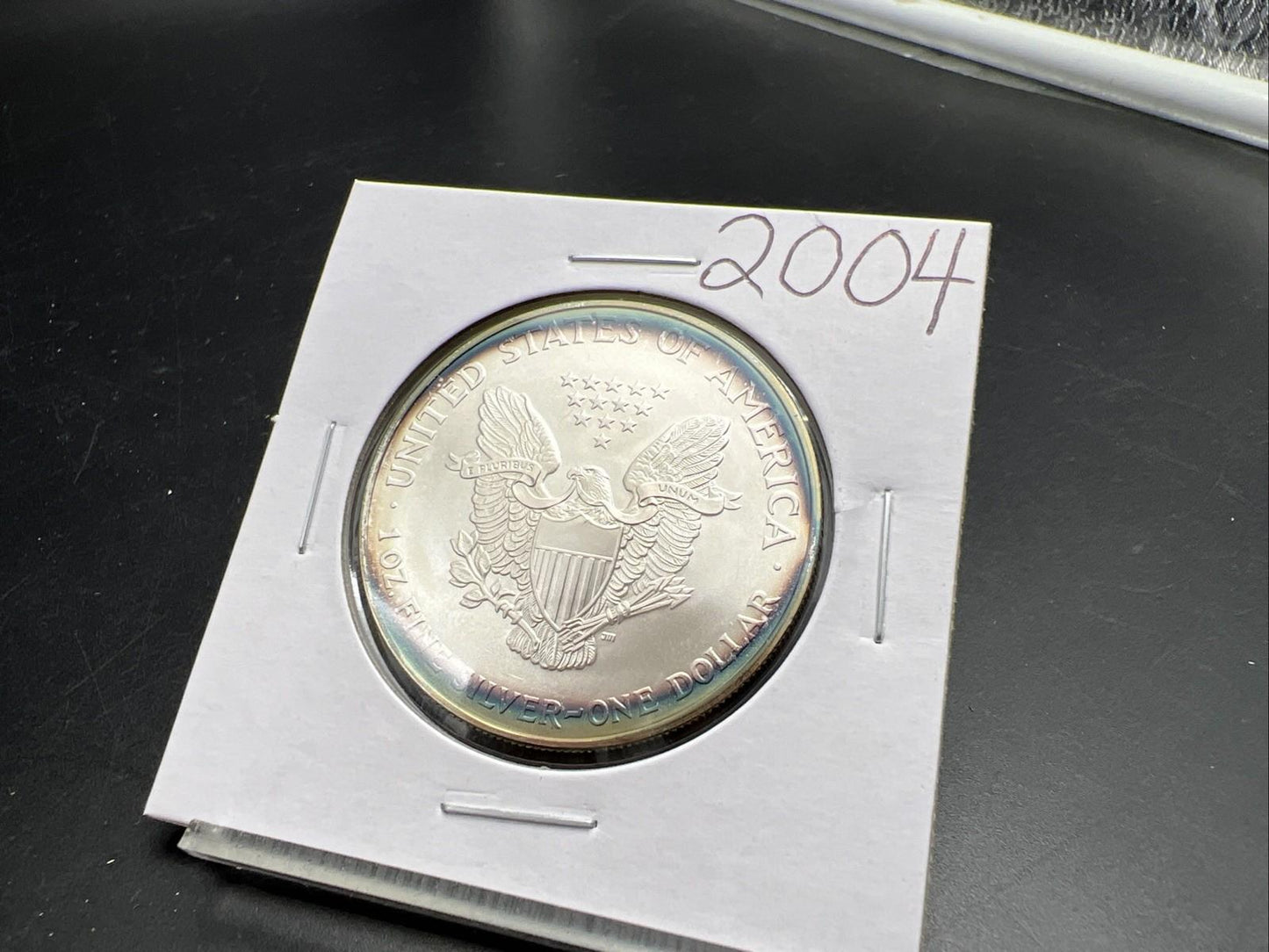 2004 1 OZ American Silver Eagle GEM BU Unc .999 Nice Toning Toner Nearly Halo