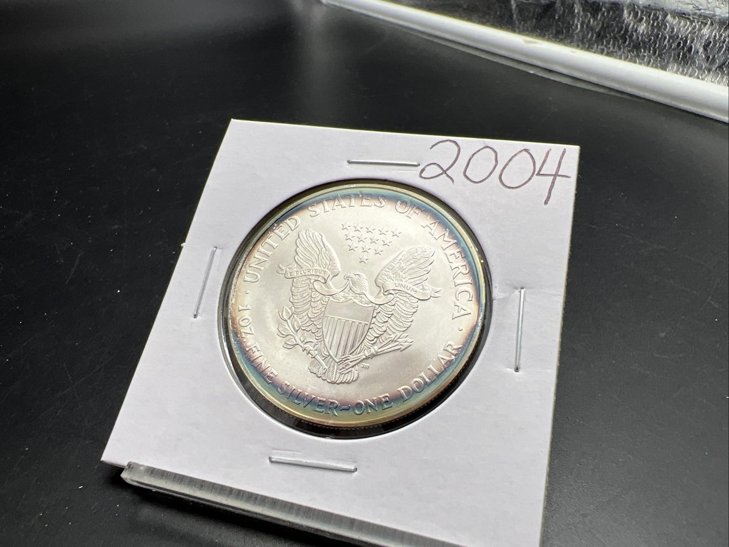 2004 1 OZ American Silver Eagle GEM BU Unc .999 Nice Toning Toner Nearly Halo