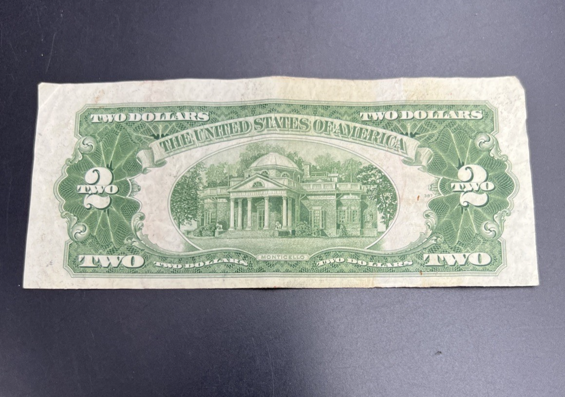 1928 G $2 USN United States Note Red Seal Fine Circulated #099