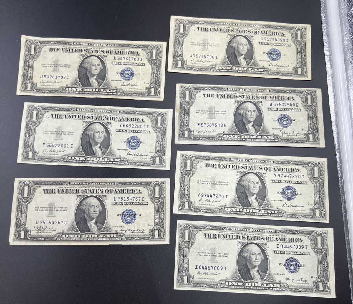 Lot of 7 1935 $1 One Dollar Silver Certificate Blue Seal Notes Fine / VF Circ #7
