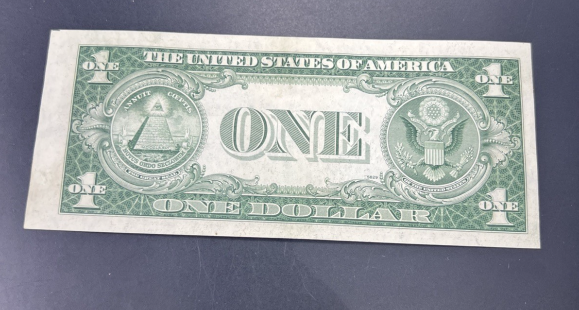 1935 E $1 One Dollar US Silver Certificate Blue Seal Choice AU About UNC #057