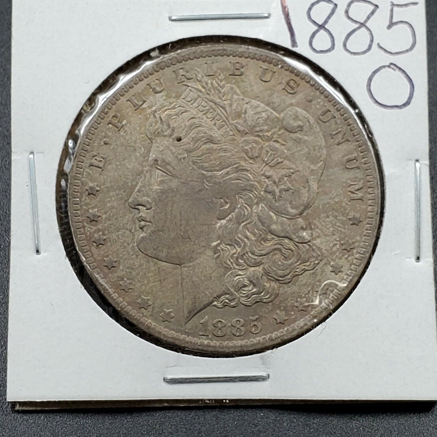 1885 O $1 Morgan Silver Dollar Coin XF AU Circulated Toned Weak Strike