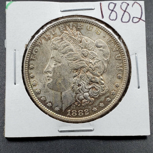 1882 P $1 Morgan Silver Eagle Dollar Coin Average BU Uncirculated Some Toning