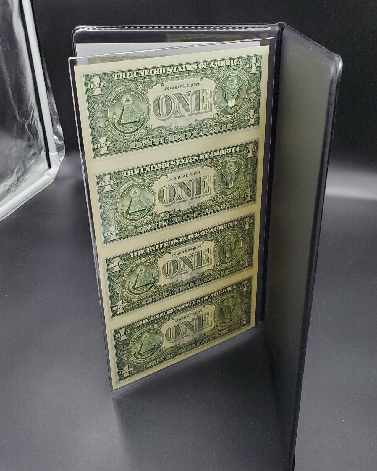 World Reserve Monetary Exchange U.S. Govt Issued Uncut Sheet of 4 $1 Bills ##C